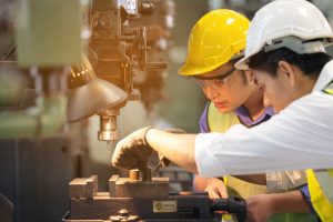 Working man in production plant